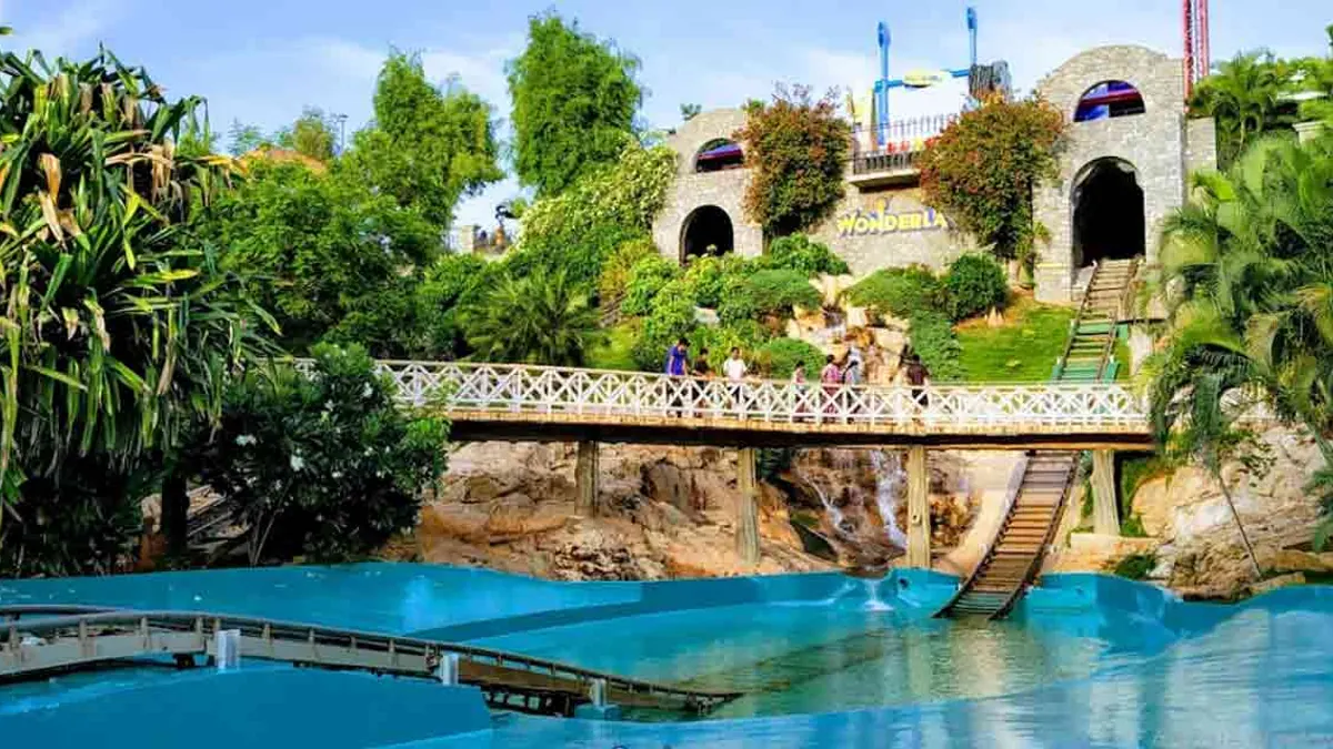 A water ride surrounded by greenery at Wonderla